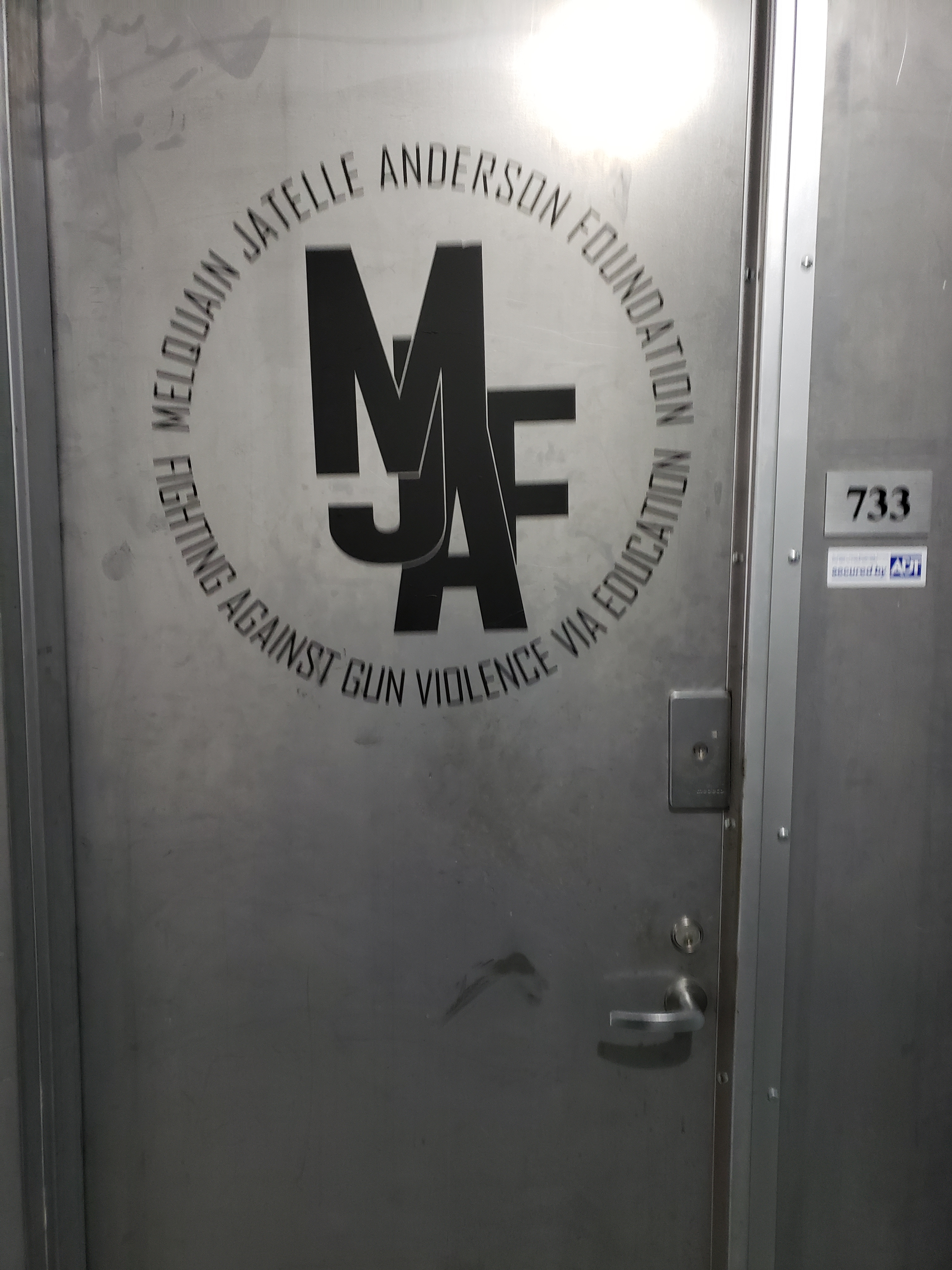 Office door with MJAF logo